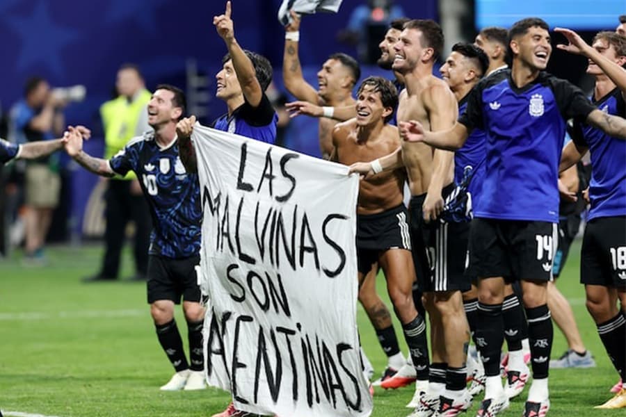 Argentine players brandish political Falklands flag after England match