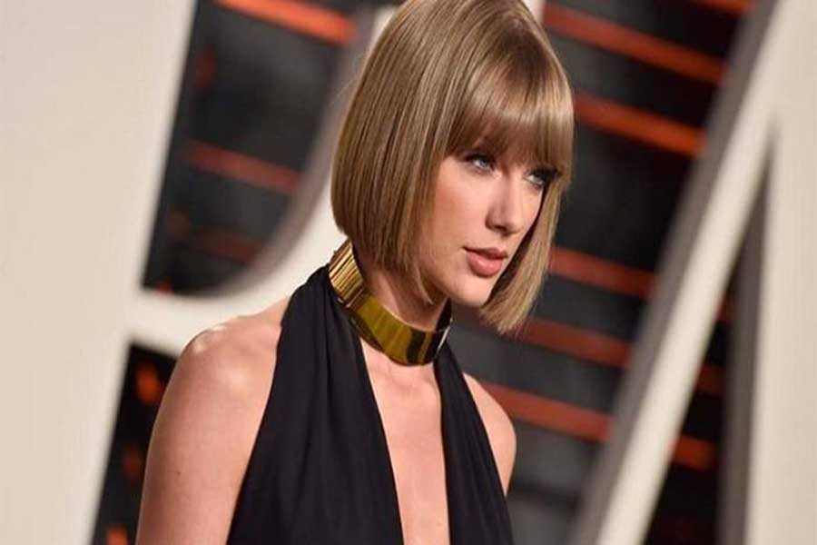 Taylor Swift wins groping trial against DJ, awarded symbolic $1