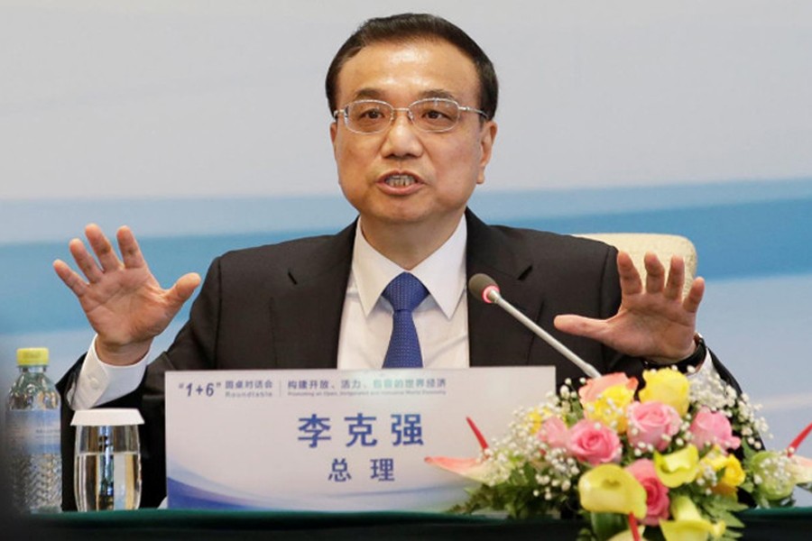 China's Premier Li Keqiang speaks during a news conference of ‘The Round Table Dialogue’ meeting at Diaoyutai State Guesthouse in Beijing, China September 12, 2017. (Reuters)