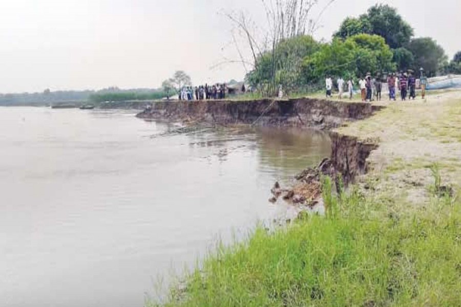 A vast area in Debinagar village under Chapainawabganj Sadar was eroded due to recent flood in the district. The snap was taken on Thursday. 	— FE Photo