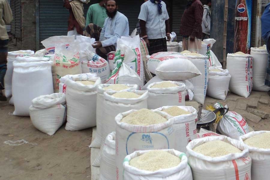 A rice market in Rajshahi. The photo was taken on Thursday. 	— FE Photo