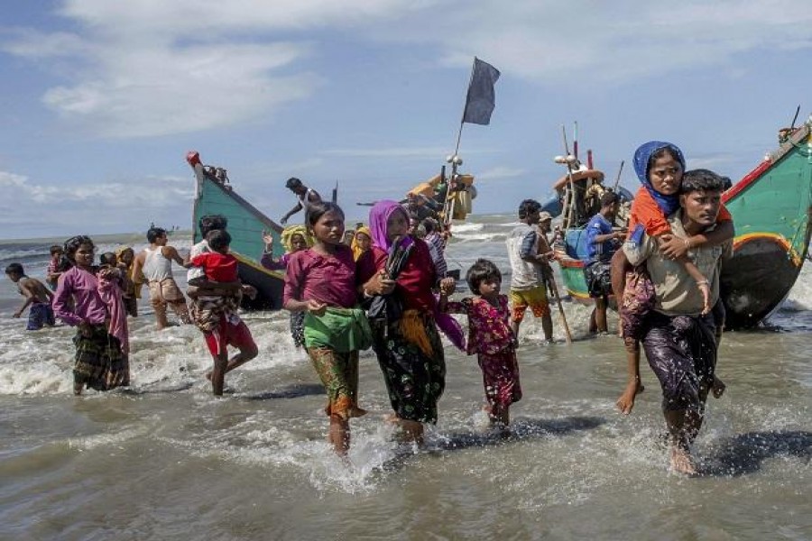 Schools reopen in restive Rakhine, but Rohingya still flee