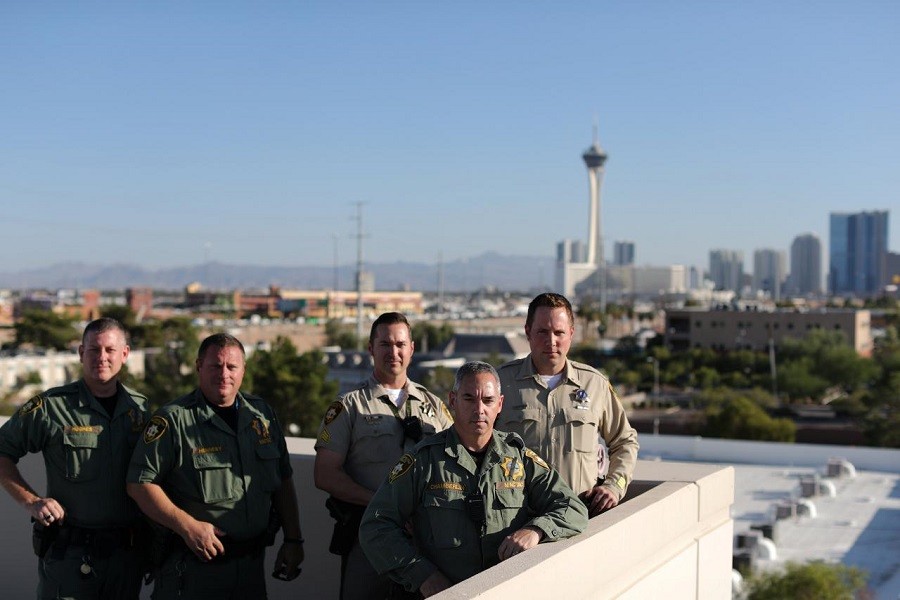 Las Vegas police officers who were part of the MACTAC (Multi-Assault Counter-Terrorism Action Capabilities) team that went into the Mandalay Bay Resort and Casino during the shooting pose for a photo in Las Vegas. Reuters