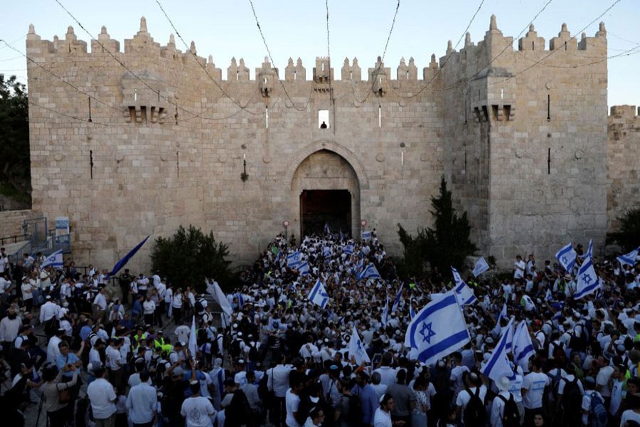 Israelis celebrate they hold Israeli flags during a parade on May 24, 2017 marking Jerusalem Day, the day in the Jewish calendar when Israel captured East Jerusalem and the Old City from Jordan during the 1967 Middle East War. - Reuters file photo