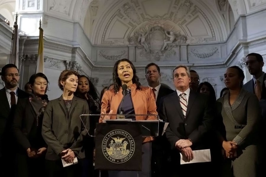 San Francisco Board of Supervisors President and acting mayor London Breed, center, speaks at a news conference at City Hall in San Francisco, Tuesday, Dec. 12, 2017.  (AP photo)