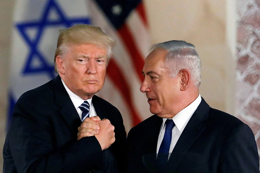 US President Donald Trump and Israeli Prime Minister Benjamin Netanyahu shake hands. - Reuters file photo