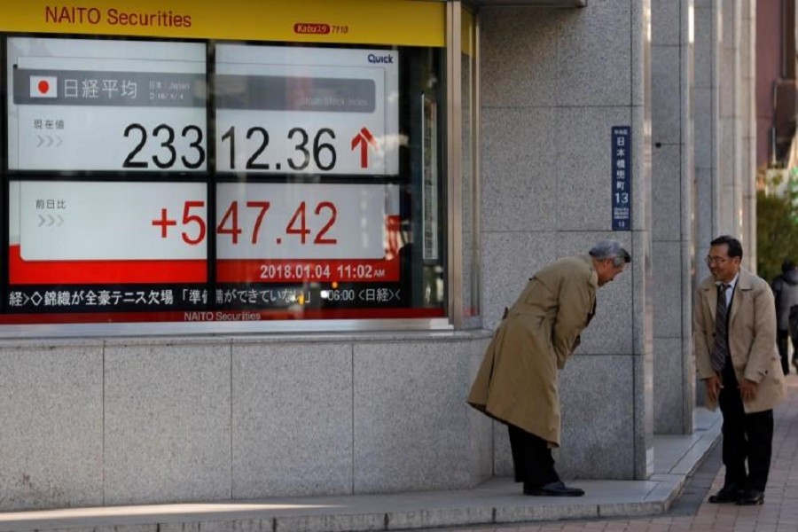 Asian shares hover near record level