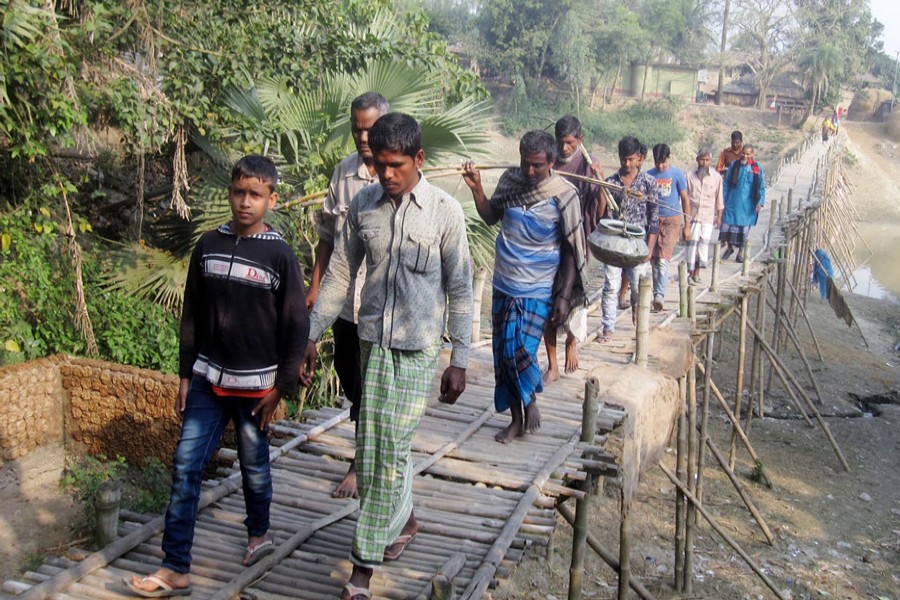 Commuters suffer in absence of bridge  over Nagor River in Adamdighi UZ