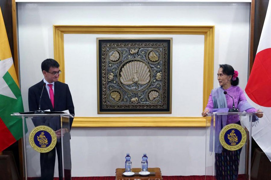 Japanese Foreign Minister Taro Kono and Myanmar’s leader Aung San Suu Kyi attend a news conference in Naypyidaw, Myanmar January 12, 2018. Reuters.
