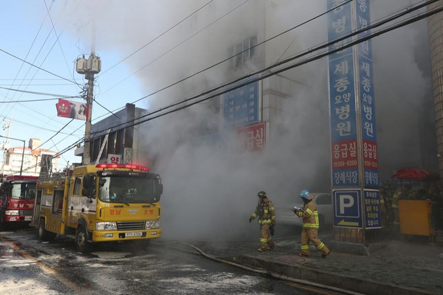 Smoke rises from a burning hospital in Miryang, South Korea on Friday. - via Reuters