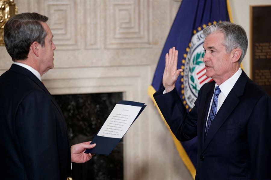 Jerome Powell (R) takes the oath of office as Chairman of the US Federal Reserve, succeeding Janet Yellen, in Washington, United States on Monday. - Xinhua photo