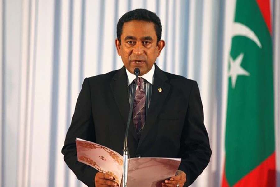 Abdulla Yameen takes his oath as the President of Maldives during a swearing-in ceremony at the parliament in Male on November 17, 2013 - Reuters/File