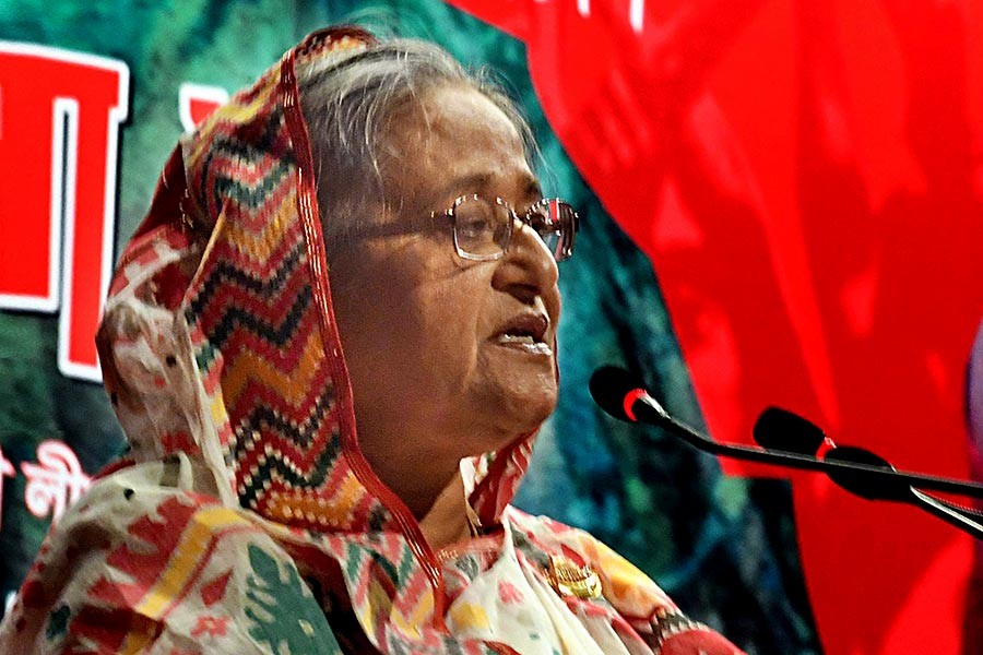 Prime Minister Sheikh Hasina is addressing a discussion in the city's Krishibid Institution auditorium on Tuesday. -Focus Bangla Photo