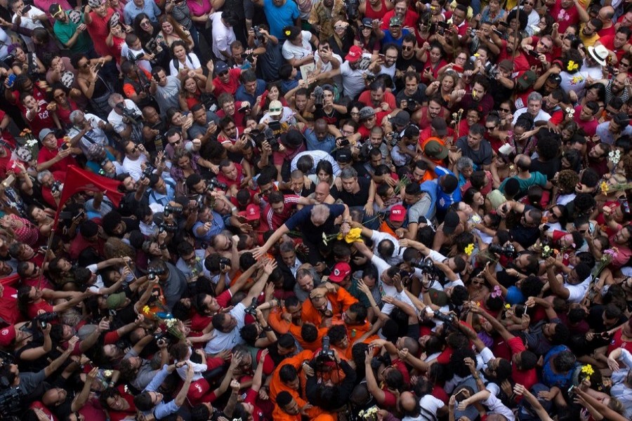 Former Brazilian President Luiz Inacio Lula da Silva is carried by supporters in front of the metallurgic trade union in Sao Bernardo do Campo, Brazil, April 7, 2018. Reuters