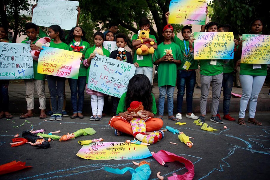 Children take part in a protest against the rape of an eight-year-old girl, in Kathua, near Jammu and a teenager in Unnao, Uttar Pradesh state, in New Delhi, India on Sunday - Reuters photo