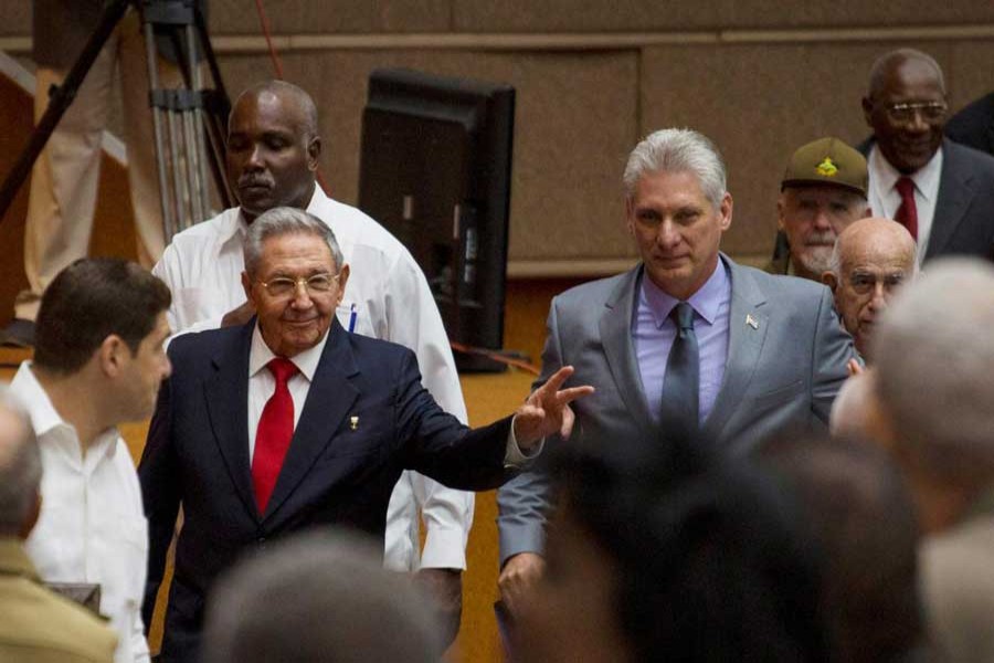 Cuba's President Raul Castro (C-L) and First Vice-President Miguel Diaz-Canel (C-R) arrive for a session of the National Assembly in Havana, Cuba, April 18, 2018. Reuters