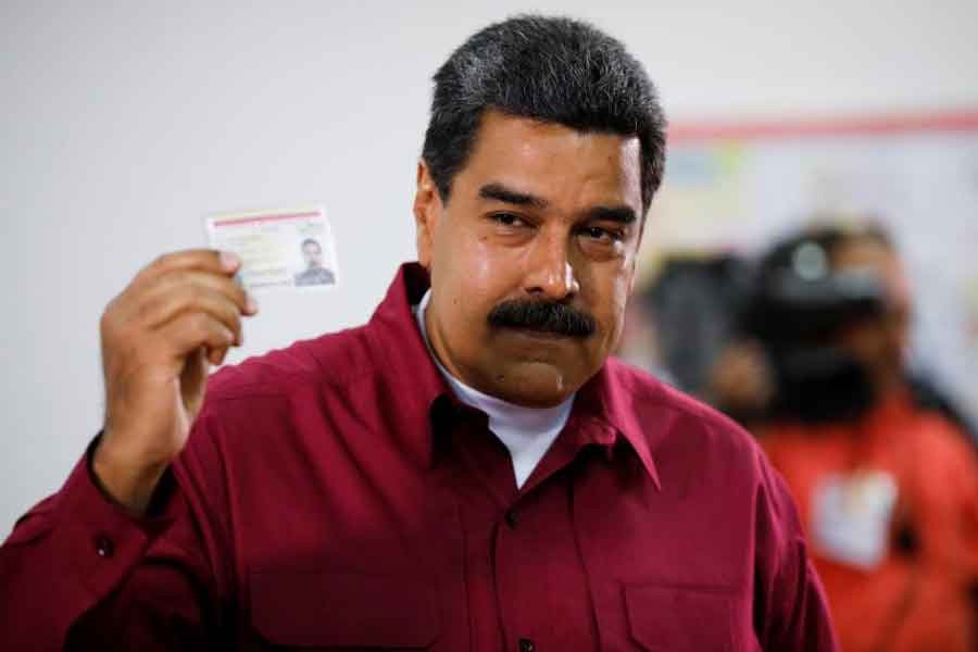 Venezuela’s President Nicolas Maduro casts his vote at a polling station, during the presidential election in Caracas, Venezuela May 20, 2018. Reuters.