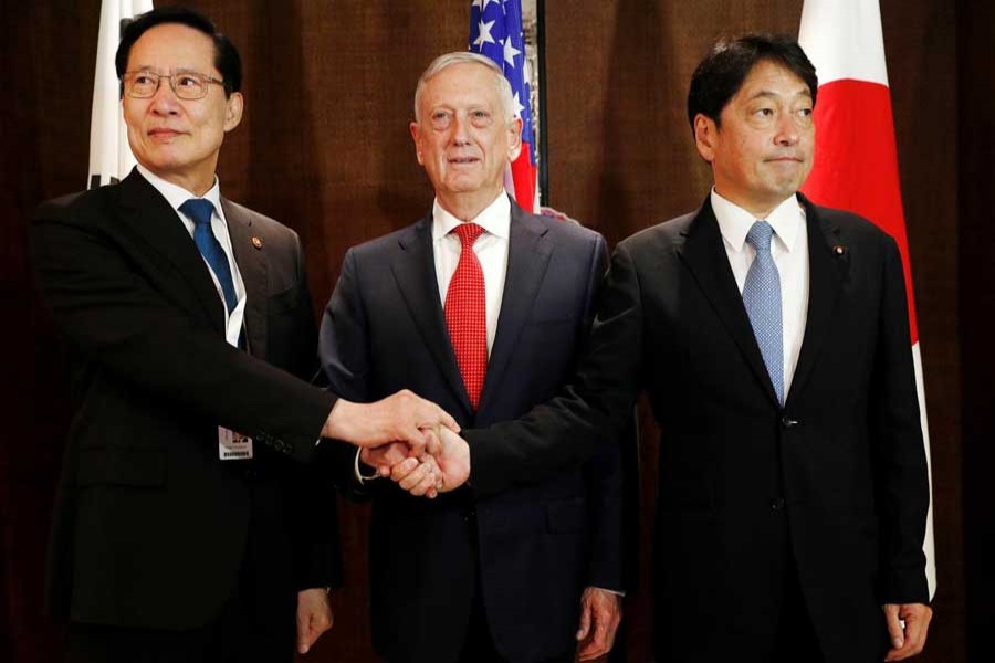 Japan's Defence Minister Itsunori Onodera, US Secretary of Defence Jim Mattis and South Korea's Defence Minister Song Young-moo attend a trilateral meeting on the sidelines of the IISS Shangri-la Dialogue in Singapore June 3, 2018. Reuters