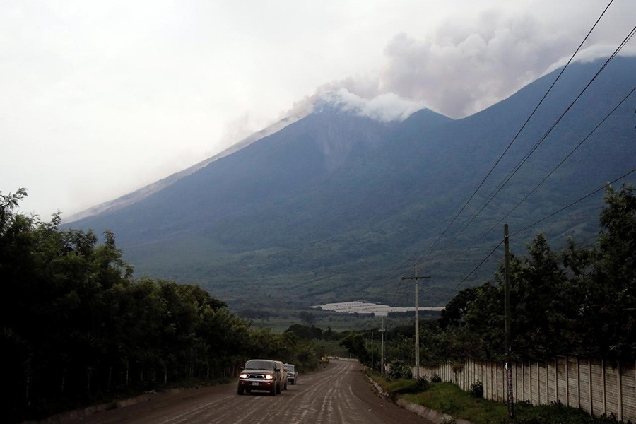 The road in front of Fuego volcano is seen covered with ash after the volcano erupted violently, in San Juan Alotenango, Guatemala on Sunday - Reuters photo