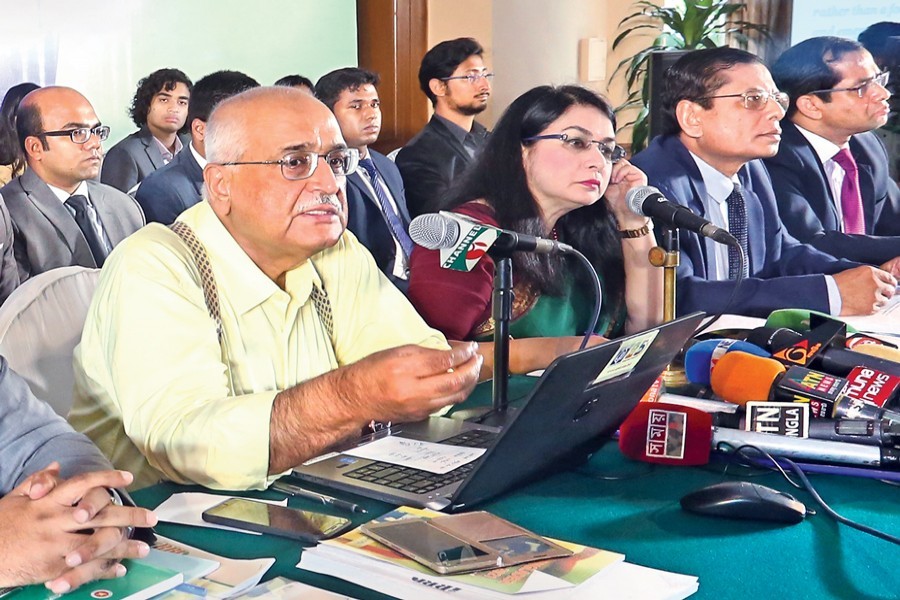Centre for Policy Dialogue (CPD) Distinguished Fellow Dr Debapriya Bhattacharya speaking at a press briefing in the city on Friday — FE photo
