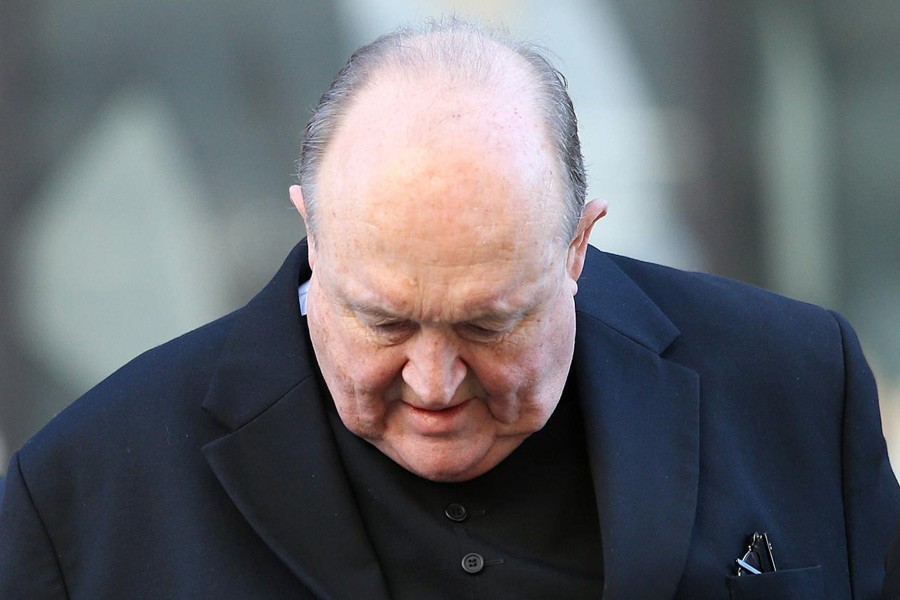 Archbishop Philip Wilson arrives at Newcastle Local Court in Newcastle, Australia, May 22, 2018. AAP/Peter Lorimer/via Reuters.
