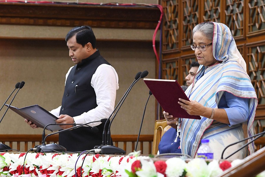 Prime Minister Sheikh Hasina and newly elected mayor of Gazipur City Corporation (GCC) Jahangir Alam during the oath taking ceremony. Focus Bangla photo