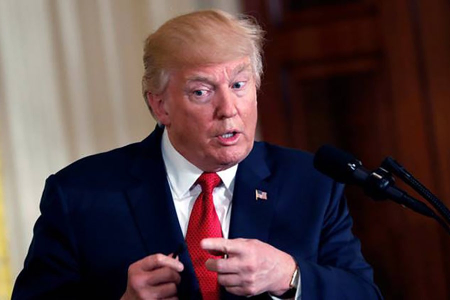 Trump warns partners on trade with Iran