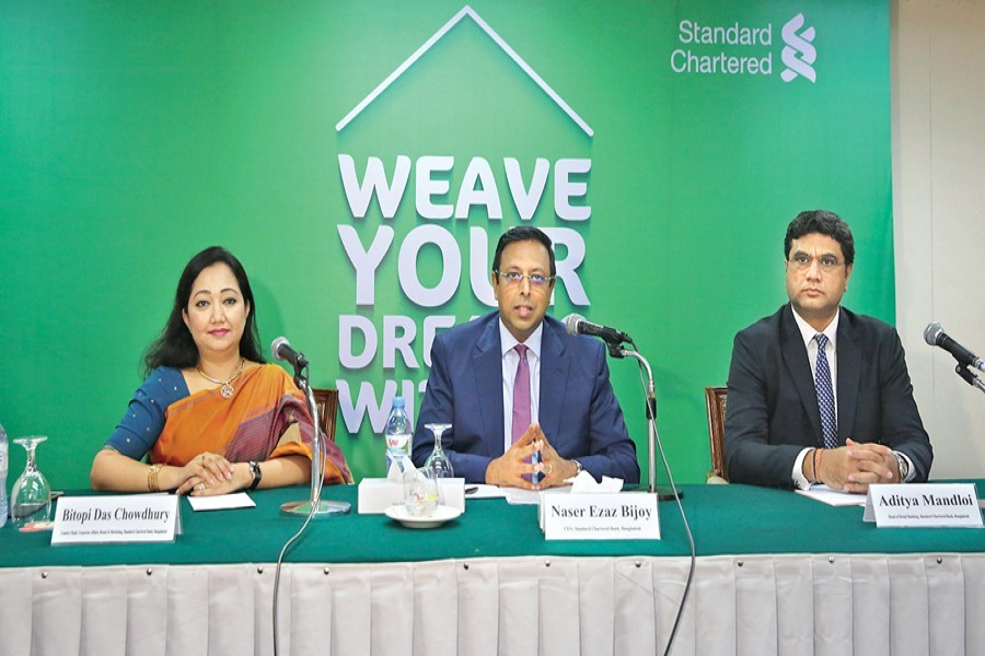Chief Executive Officer of Standard Chartered in Bangladesh Naser Ezaz Bijoy speaking at a press briefing on 'MortgageOne', a new variant of home finance solution, in the capital on Tuesday