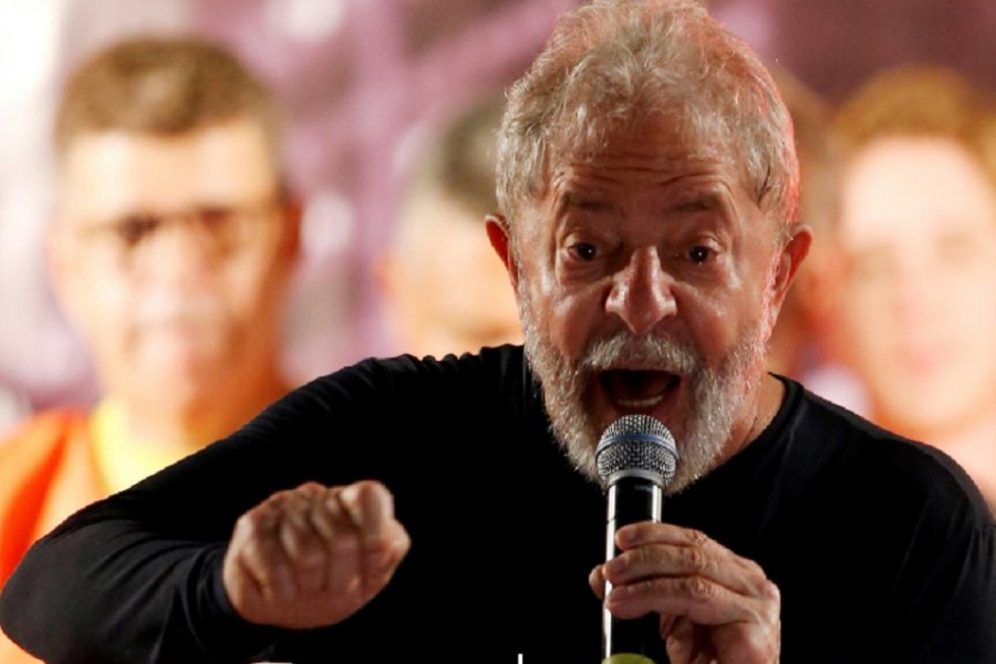 Former Brazilian President Luiz Inacio Lula da Silva speaks during a rally in Curitiba, Brazil, March 28, 2018. - Reuters