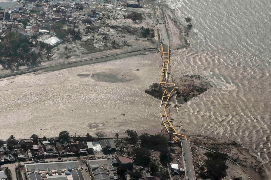 An aerial view shows a bridge damaged by an earthquake and tsunami in Palu, Central Sulawesi, Indonesia, September 29, 2018. Reuters