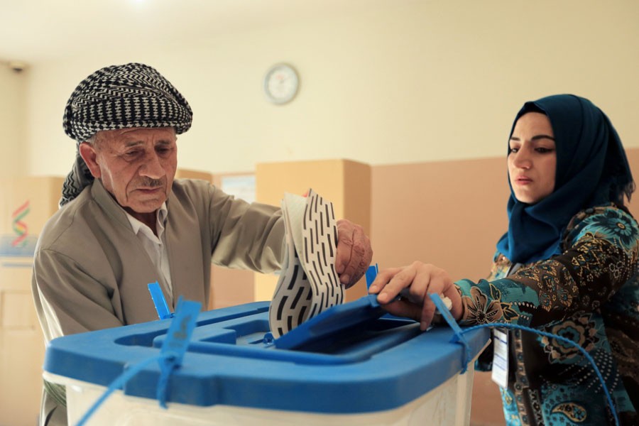 A Kurdish man casts his vote at a polling station during parliamentary elections in the semi-autonomous region in Duhok, Iraq September 30, 2018 – Reuters