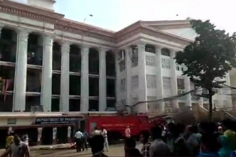 Smoke billows from the Kolkata Medical College and Hospital after a fire broke out in the pharmacy — Twitter photo