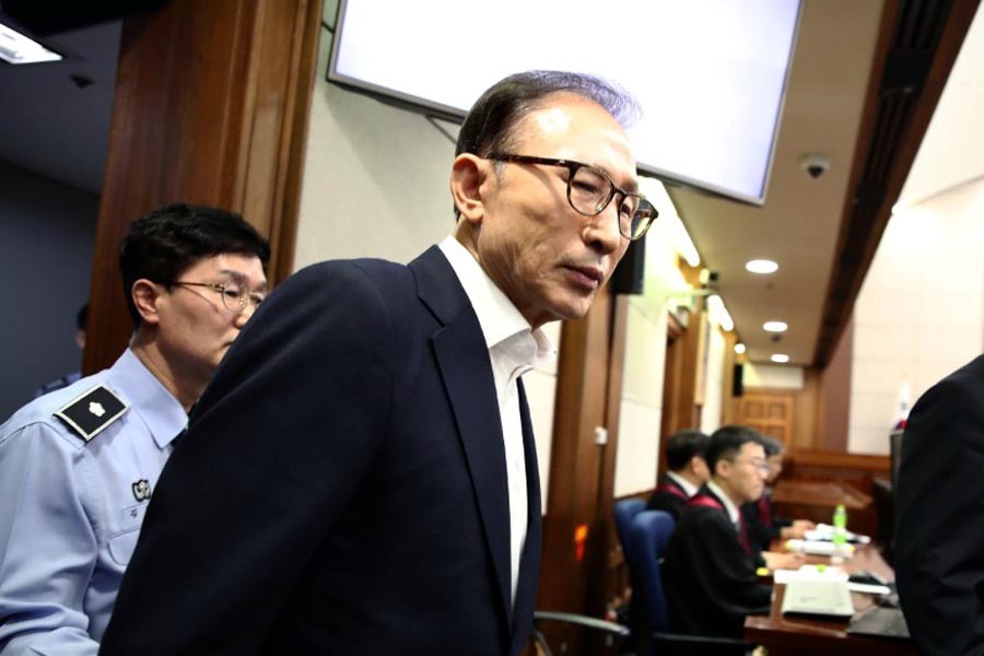 Former South Korean President Lee Myung-Bak appears for his first trial at the Seoul Central District Court on May 23, 2018 in Seoul, South Korea. Reuters photo