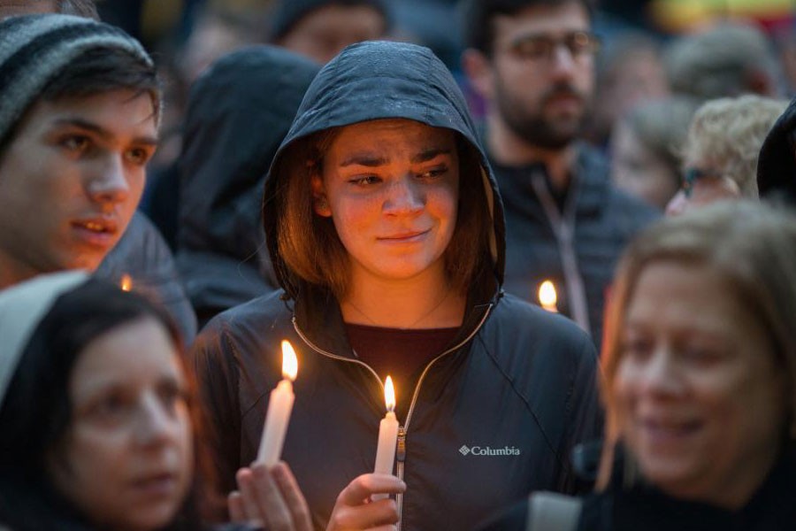 People mourn the loss of life as they hold a vigil for the victims of Pittsburgh synagogue shooting in Pittsburgh, Pennsylvania, US, October 27, 2018 - Reuters
