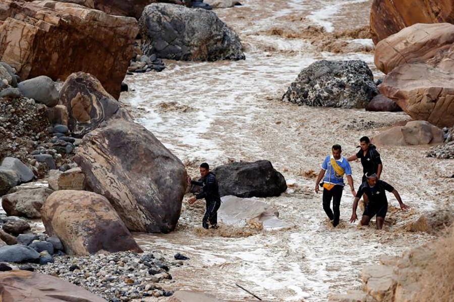 Rescuers combed the shores of Jordan's Dead Sea on October 26 last, searching for survivors, after flash floods killed at least 21 people, most of them children on a school outing — Reuters photo