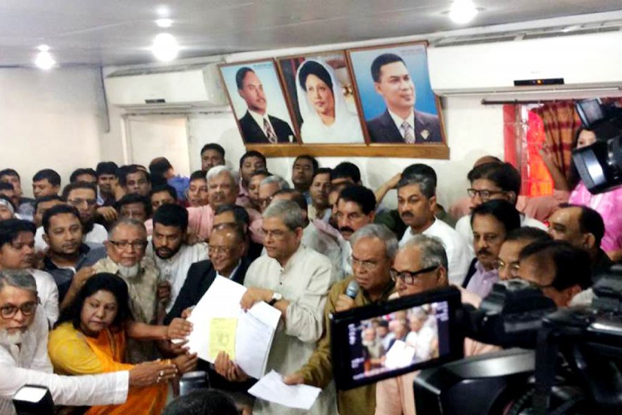 BNP secretary general Mirza Fakhrul Islam Alamgir collects nomination form at the party's central office at Nayapaltan in Dhaka city. File photo