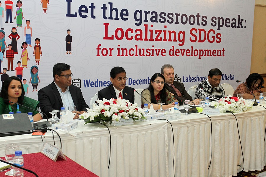 Planning Commission member (general economic division) Professor Shamsul Alam speaking at a dialogue titled 'Let the Grassroots Speak: Localising SDGs for Inclusive Development,' jointly organised by Centre for Policy Dialogue (CPD) and Oxfam Bangladesh, at a hotel in the city on Wednesday — FE photo