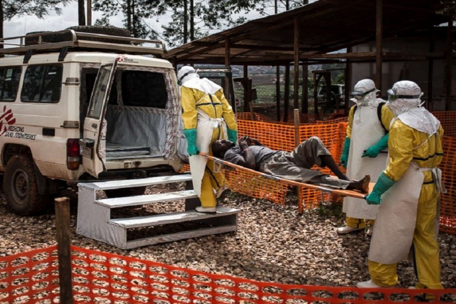 Health workers move a patient to a hospital after he was cleared of having Ebola inside of a Medecins Sans Frontieres supported Ebola treatment centre in Butembo, Congo, November 4, 2018. - AP