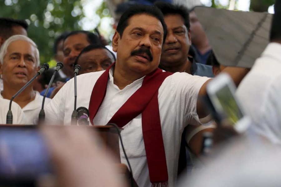 Former Sri Lankan president Mahinda Rajapaksa speaks to his supporters at his residence in Medamulana July 1, 2015 - Reuters/Dinuka Liyanawatte