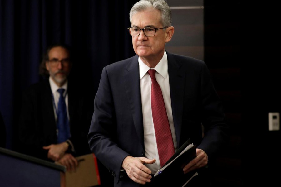 Federal Reserve Board Chairman Jerome Powell arrives at his news conference after a Federal Open Market Committee meeting in Washington, US, December 19, 2018. Reuters