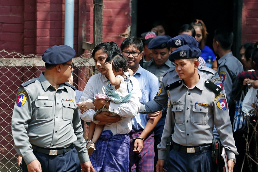 Detained Reuters journalist Wa Lone and Kyaw Soe Oo arrive at Insein court in Yangon, Myanmar August 27, 2018. Reuters/File Photo