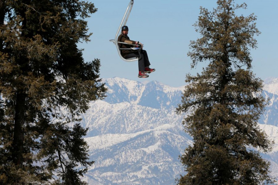 A man rides the chair lift at the ski resort in Malam Jabba, Pakistan February 7, 2017. Reuters /File photo