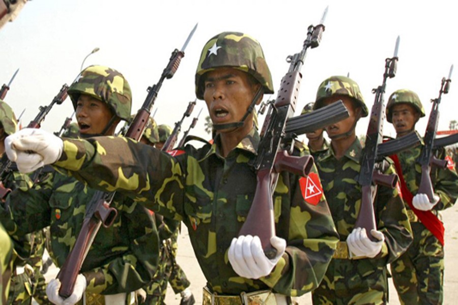 A file photo taken on October 14, 2016 showing military from Kachin Independence Army (KIA) preparing for military drills at the group's headquarters in Laiza, Kachin State	— AP