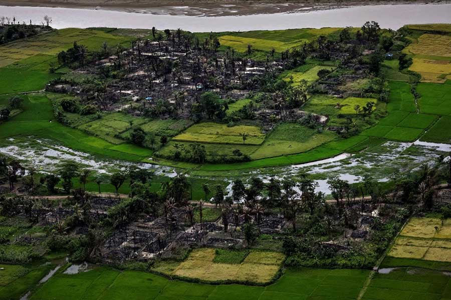 The aerial photograph showing the remains of a burned Rohingya village near Maungdaw, north of Rakhine State, Myanmar. The photo was taken on September 27, 2017. -Reuters file photo