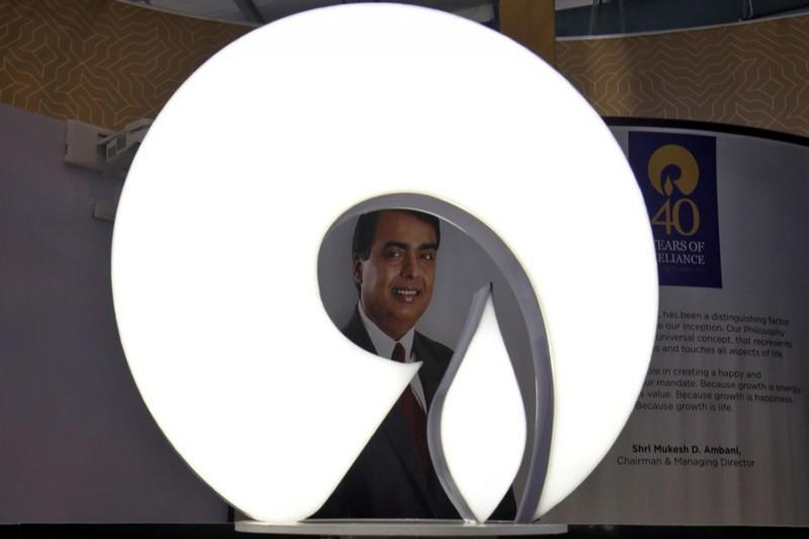 The logo of Reliance Industries is pictured in a stall at the Vibrant Gujarat Global Trade Show at Gandhinagar, January 17, 2019. Reuters
