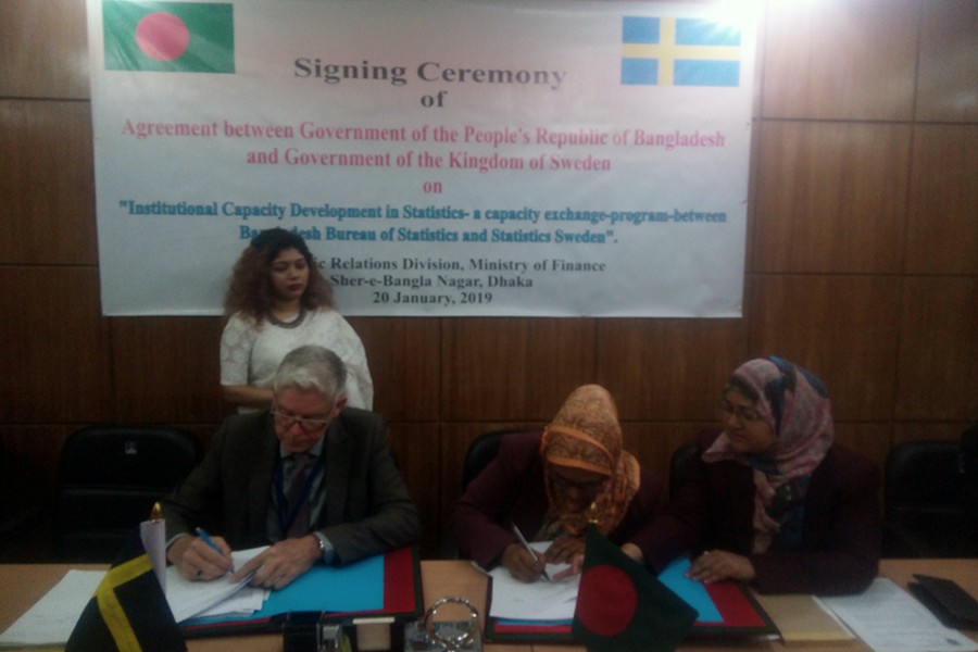A view of signing an agreement between governments of Bangladesh and Sweden on capacity development in statistics in Dhaka on Sunday