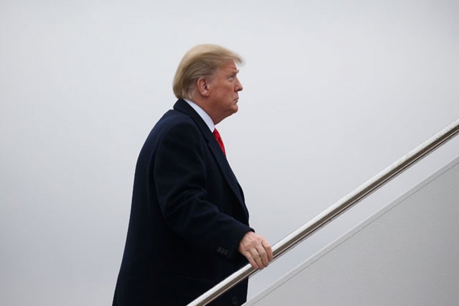 US President Trump departs for a rally in Texas. Reuters