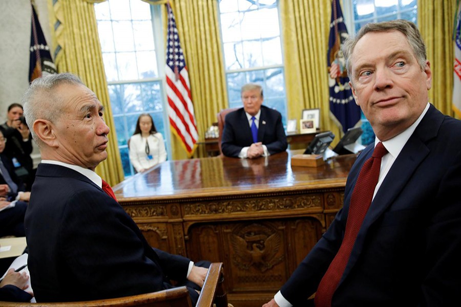 China's Vice Premier Liu He (L) turns with US Trade Representative Robert Lighthizer (R) during a meeting with US President Donald Trump in the Oval Office at the White House in Washington, US on February 22 — Reuters photo