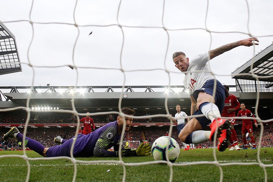Tottenham's Toby Alderweireld scores an own goal and Liverpool's second during the dying moments in Sunday's  clash — Reuters photo