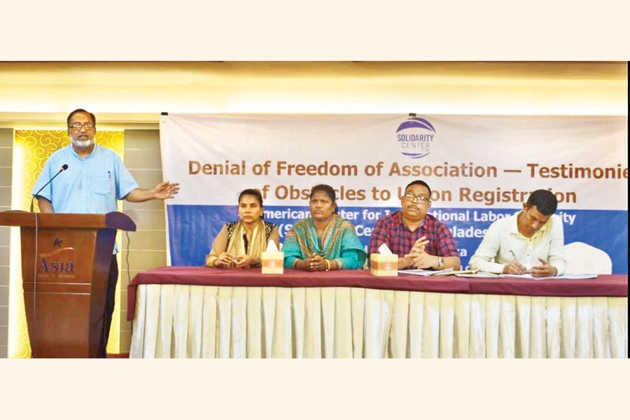 AK Nasim, senior legal counsellor of Solidarity Center- Bangladesh, presenting the findings and recommendations of a report on 'Denial of Freedom of Association- Testimonies of Obstacles to Union Registration' at a city hotel on Tuesday